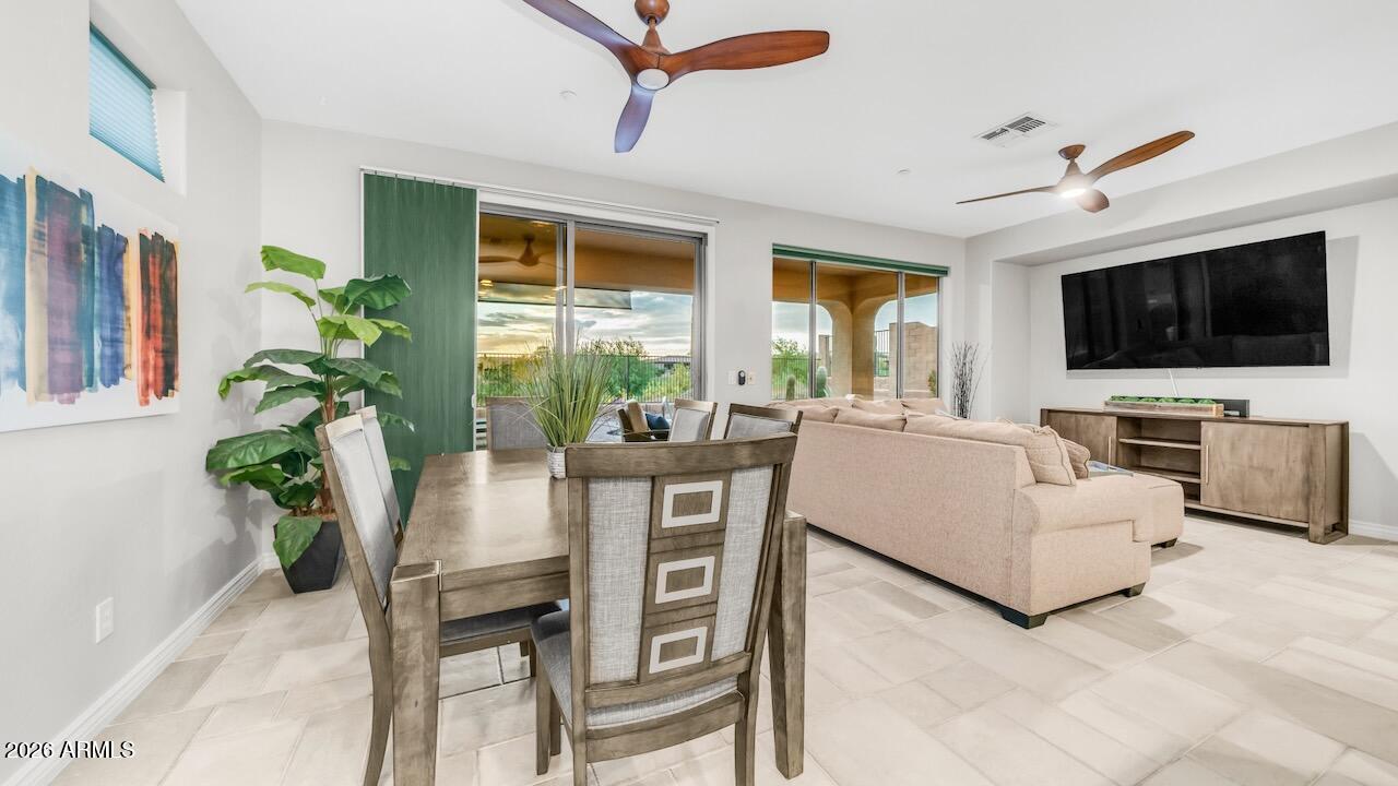 41902 North Crooked Stick Road Anthem, AZ 85086 - Photo 14 of 41 a living room with furniture and a flat screen tv