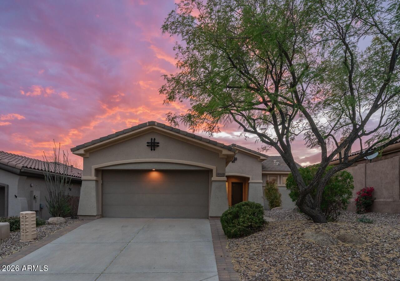 41902 North Crooked Stick Road Anthem, AZ 85086 - Photo 2 of 41 a front view of a house with garden