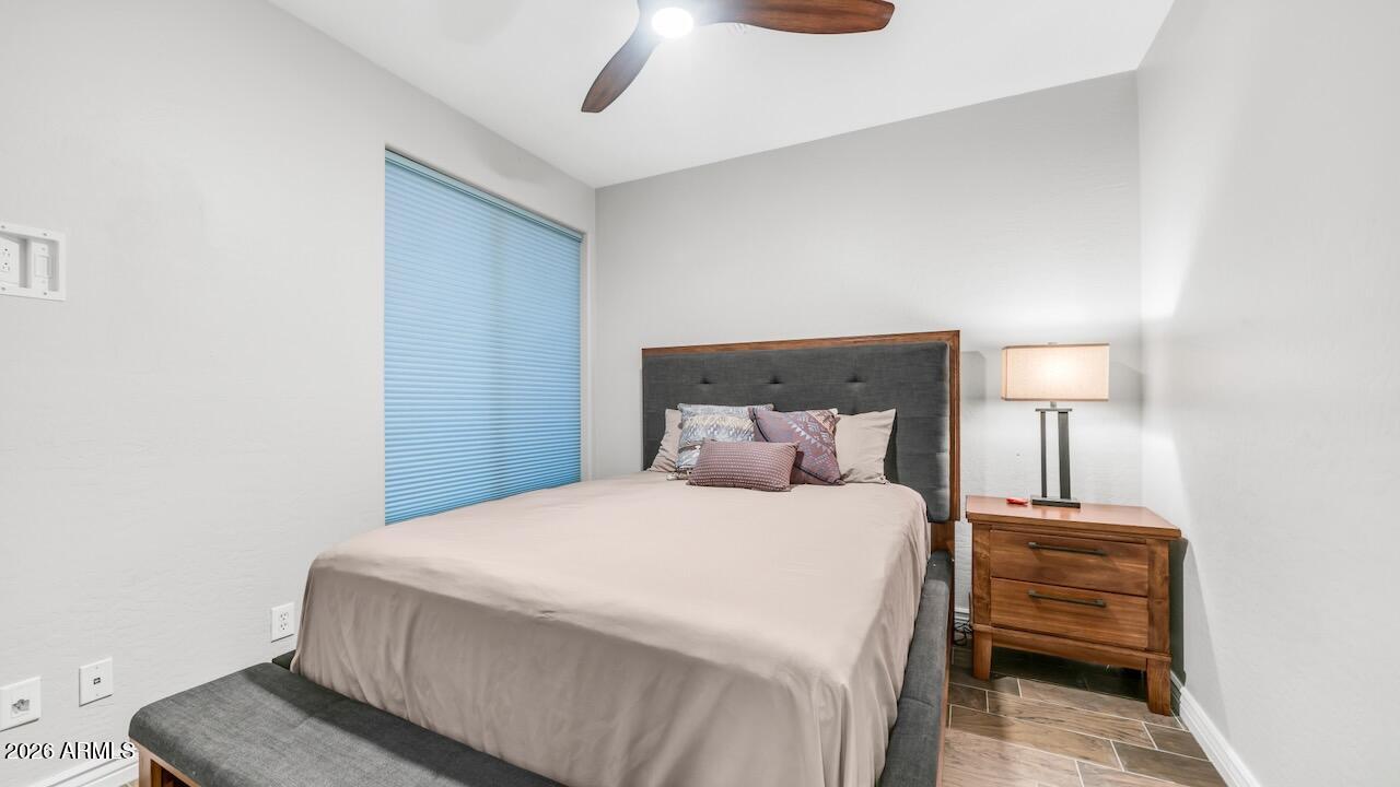 41902 North Crooked Stick Road Anthem, AZ 85086 - Photo 9 of 41 a bedroom with a bed and a night stand