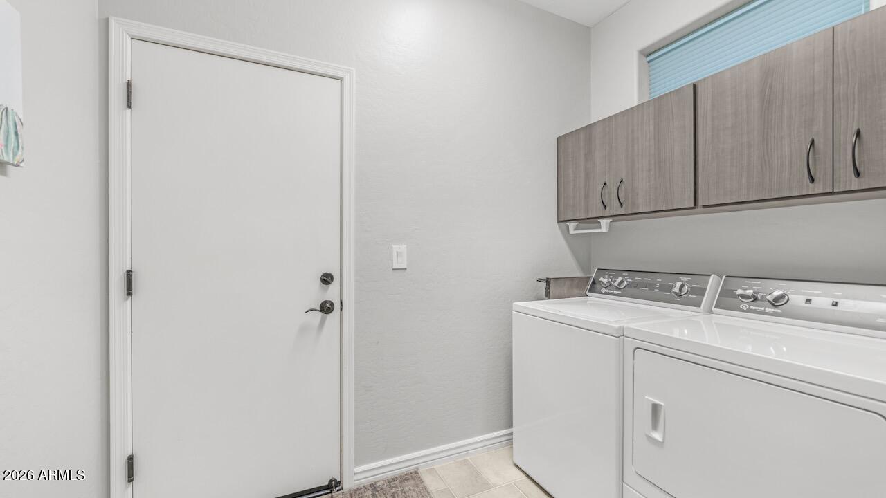 41902 North Crooked Stick Road Anthem, AZ 85086 - Photo 10 of 41 a utility room with dryer and washer