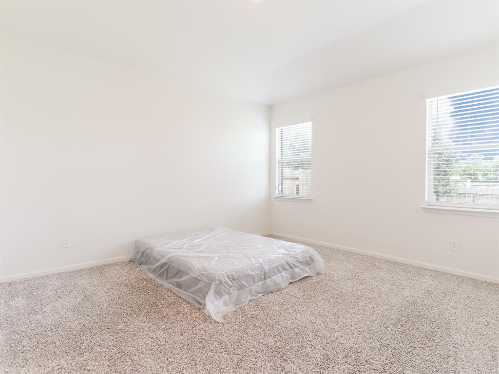 608 Aqueduct Drive Seagoville, TX 75159 - Photo 17 of 20 an empty room with windows