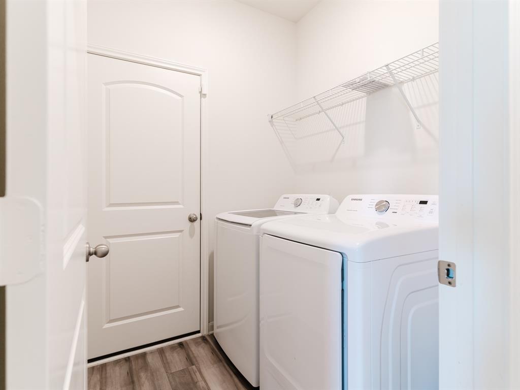 608 Aqueduct Drive Seagoville, TX 75159 - Photo 19 of 20 a utility room with dryer and washer