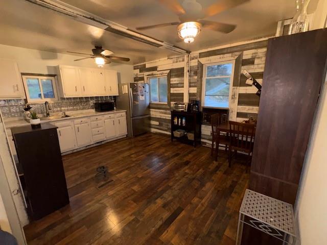101 Fishpot Road Fredericktown, PA 15333 - Photo 8 of 21 a kitchen with sink cabinets and wooden floor