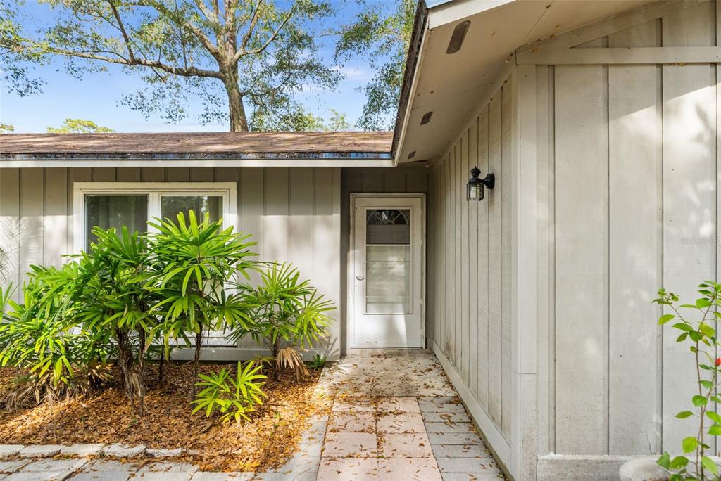 3116 West University Avenue Gainesville, FL 32607 - Photo 5 of 31 a front view of a house with garden