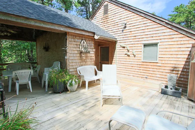 a front view of a house with patio