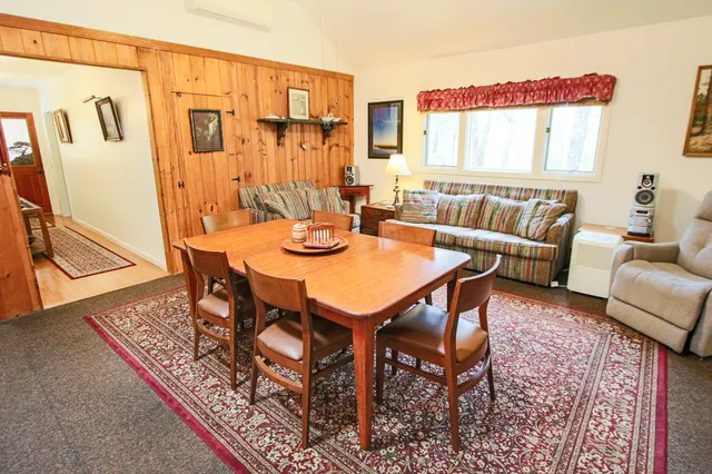 a view of a dining room with furniture