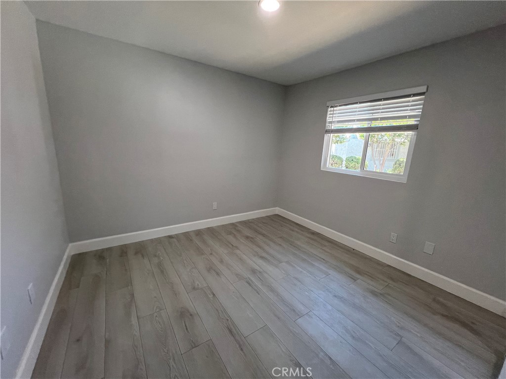7561 Donna Avenue Reseda, CA 91335 - Photo 20 of 30 wooden floor in an empty room