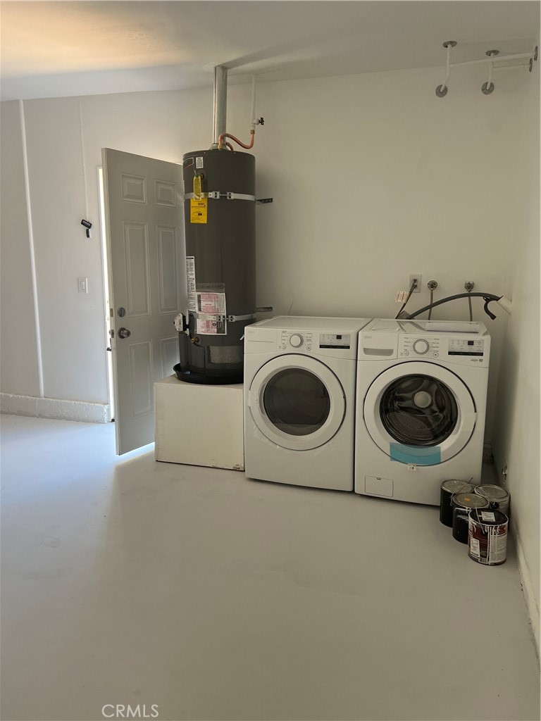 7561 Donna Avenue Reseda, CA 91335 - Photo 28 of 30 a utility room with dryer and washer