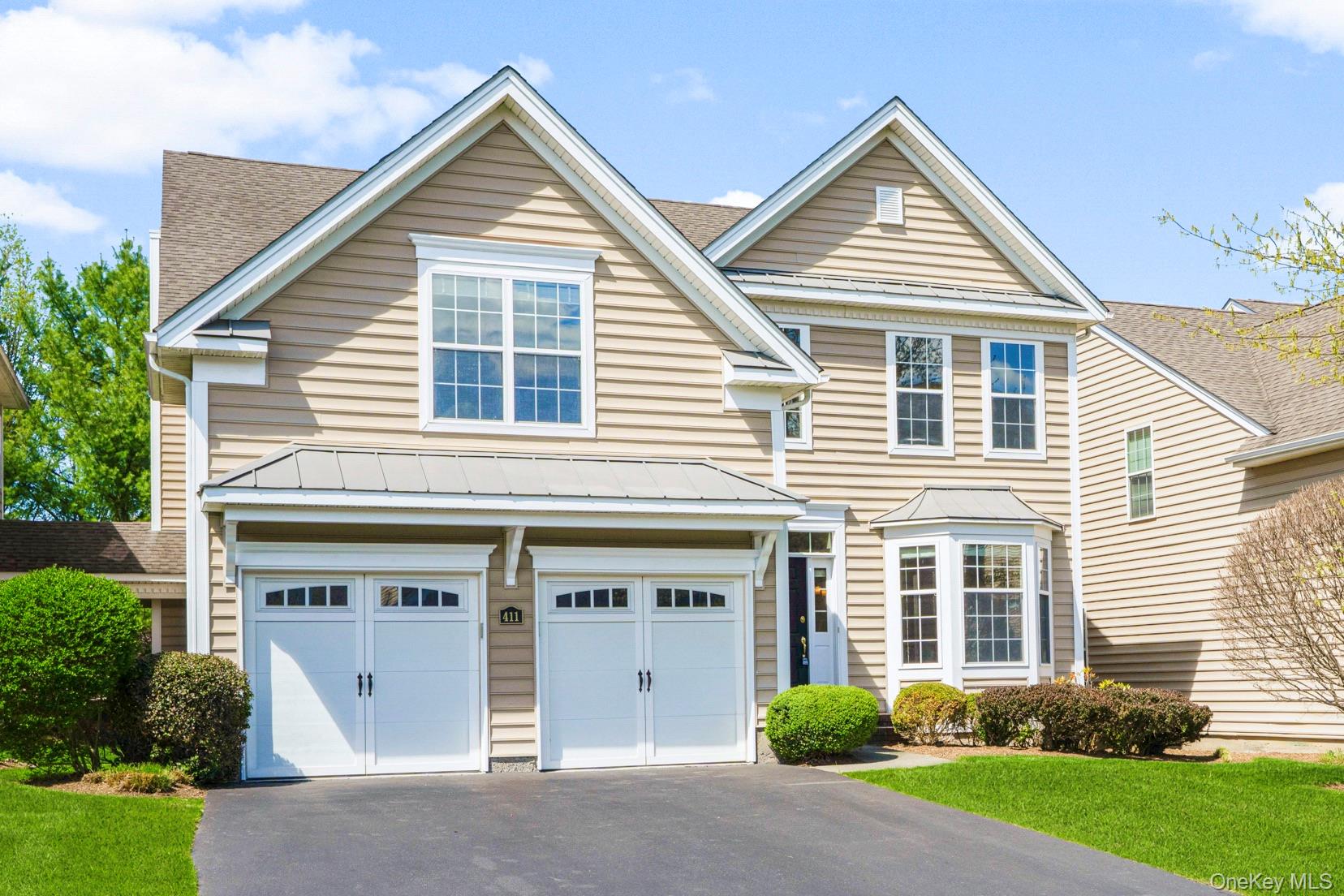 411 Vassar Place Fishkill, NY 12524 - Photo 2 of 39 front view of a house and a yard