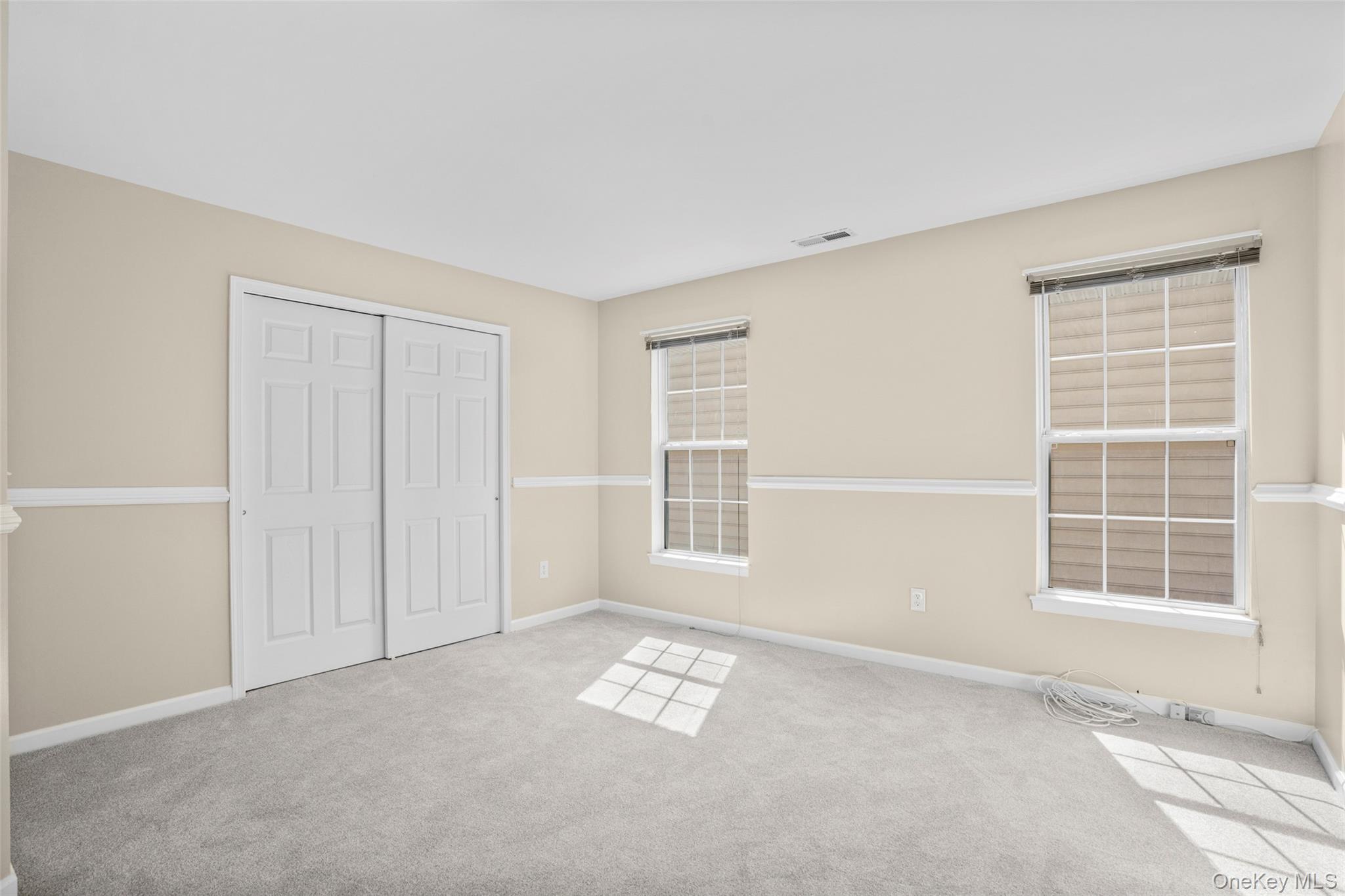411 Vassar Place Fishkill, NY 12524 - Photo 29 of 39 a view of an empty room with a window