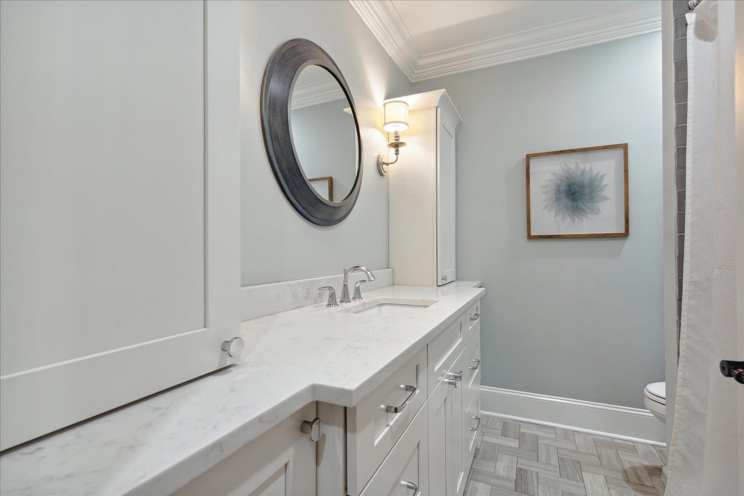 279 Ridgefield Road Memphis, TN 38111 - Photo 14 of 23 a bathroom with a sink and a mirror