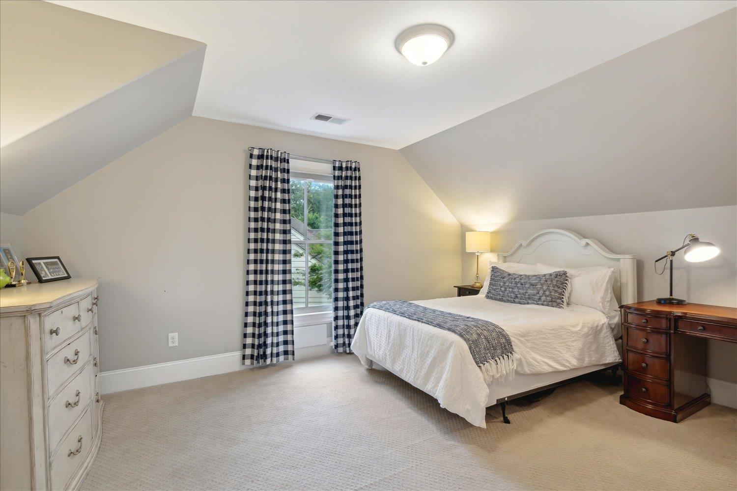 279 Ridgefield Road Memphis, TN 38111 - Photo 16 of 23 a bedroom with a bed and a night stand