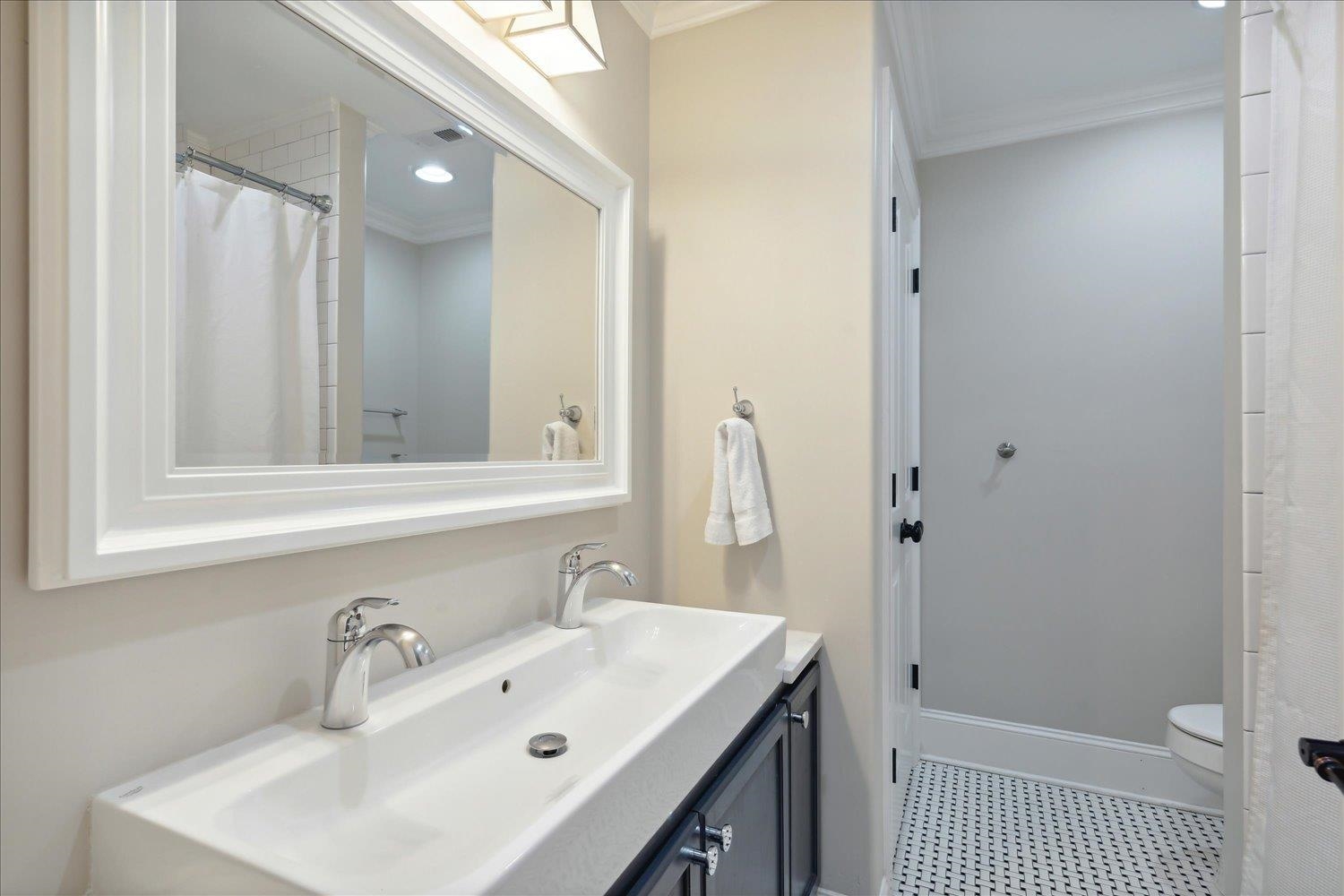 279 Ridgefield Road Memphis, TN 38111 - Photo 17 of 23 a bathroom with a sink a toilet and shower