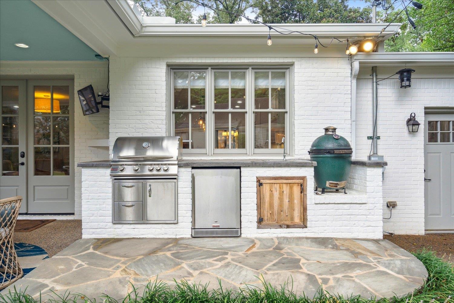 279 Ridgefield Road Memphis, TN 38111 - Photo 23 of 23 a front view of a house with a yard and garage