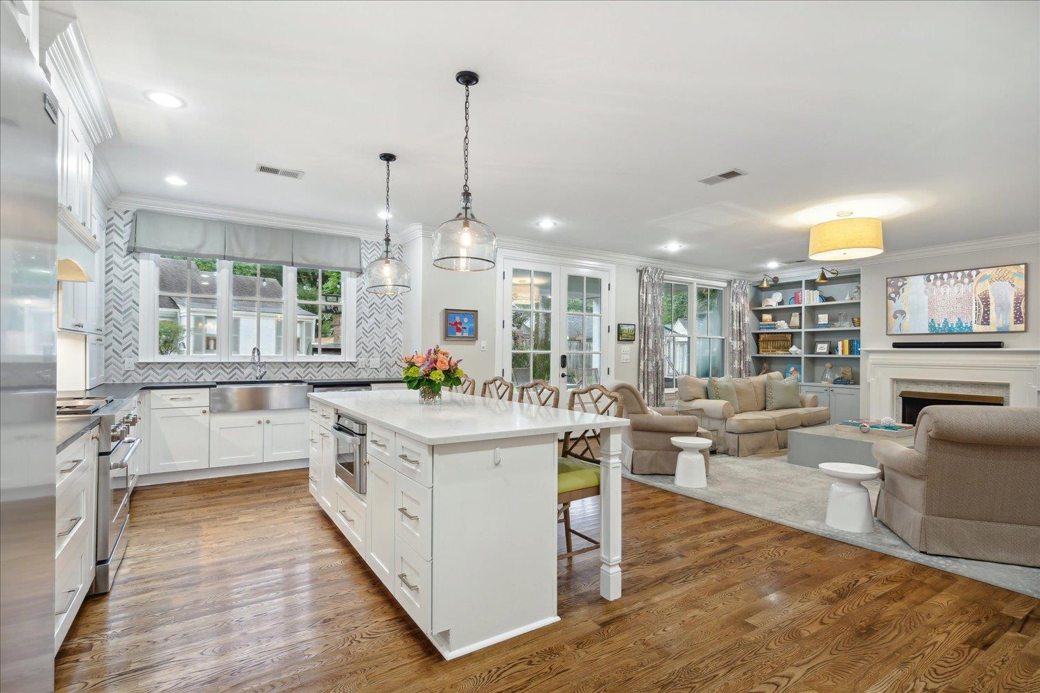 279 Ridgefield Road Memphis, TN 38111 - Photo 6 of 23 a large white kitchen with a large window and stainless steel appliances