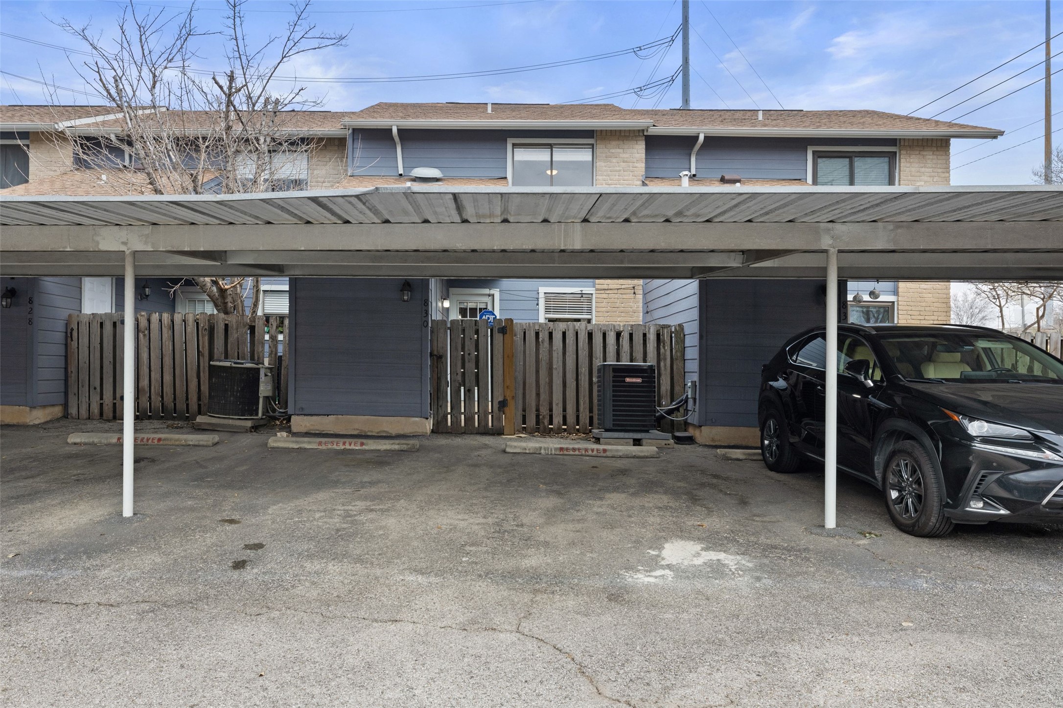 830 Banister Lane Austin, TX 78704 - Photo 16 of 38 2 reserved and covered parking spots behind the unit