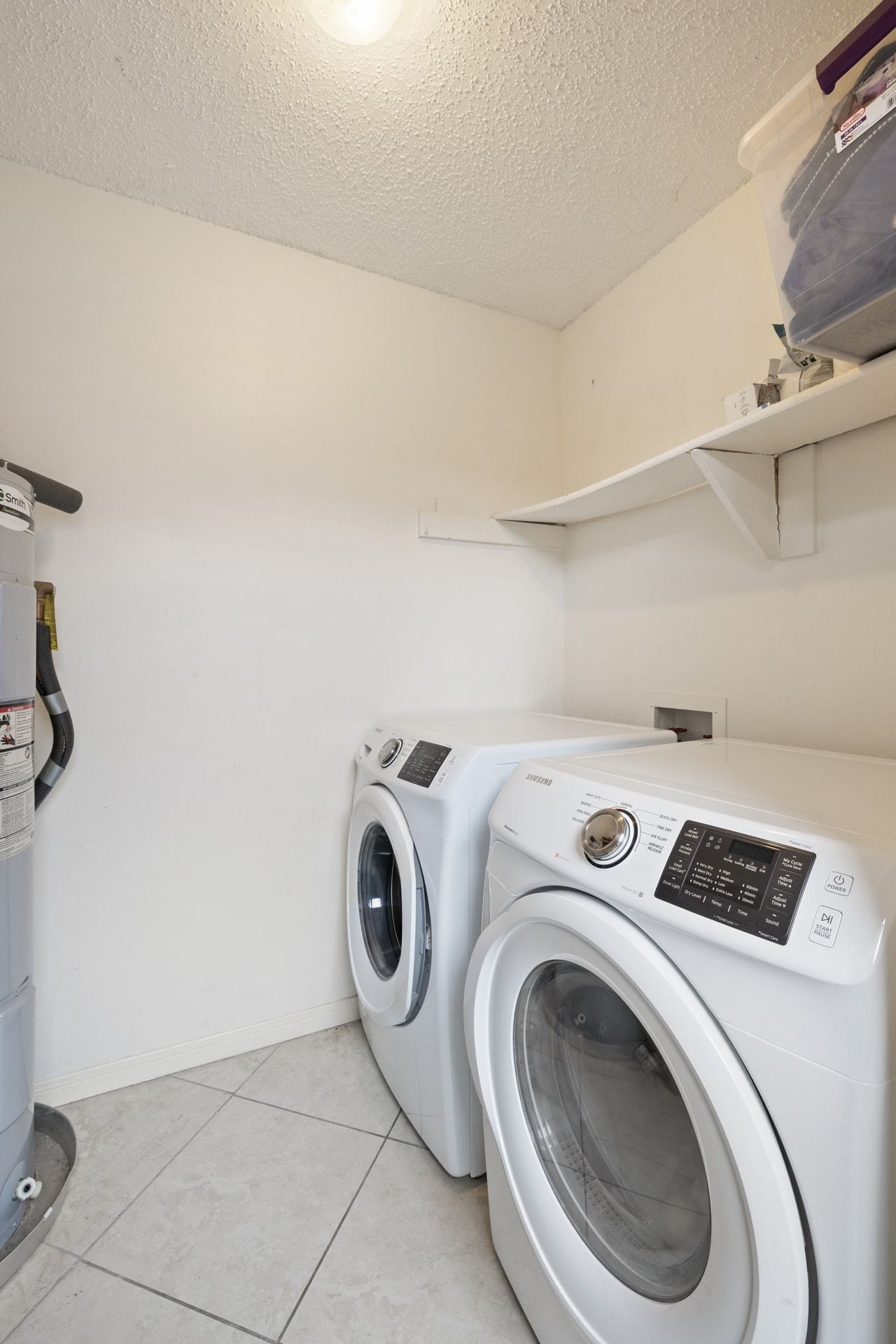 830 Banister Lane Austin, TX 78704 - Photo 21 of 38 Full-sized laundry room with storage off of back patio