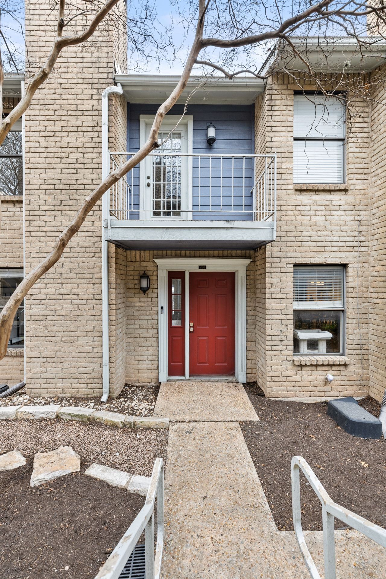 830 Banister Lane Austin, TX 78704 - Photo 22 of 38 Front of condo with balcony off of the main bedroom upstairs