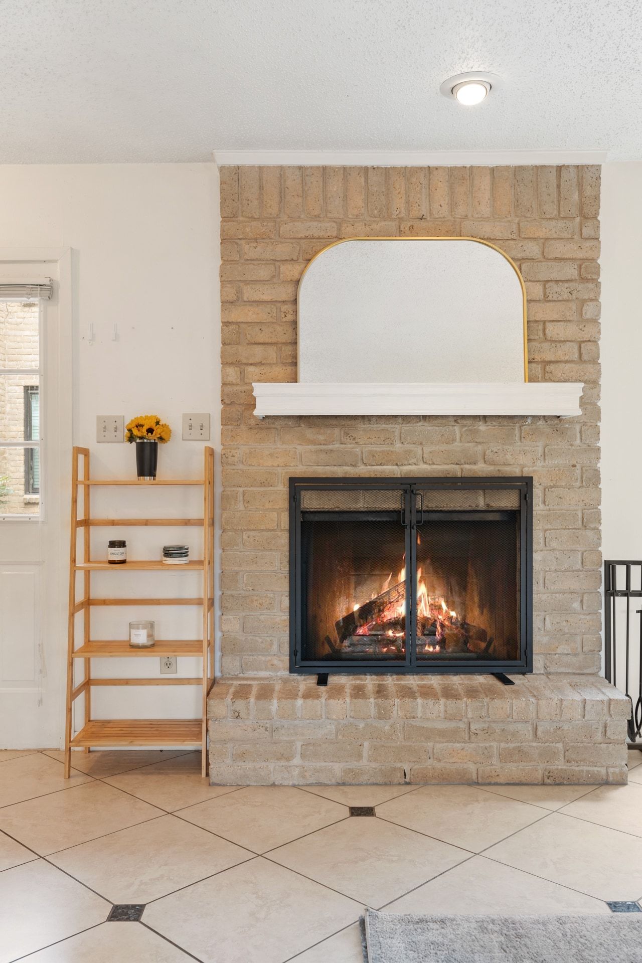 830 Banister Lane Austin, TX 78704 - Photo 7 of 38 Wood-burning fireplace in living room downstairs