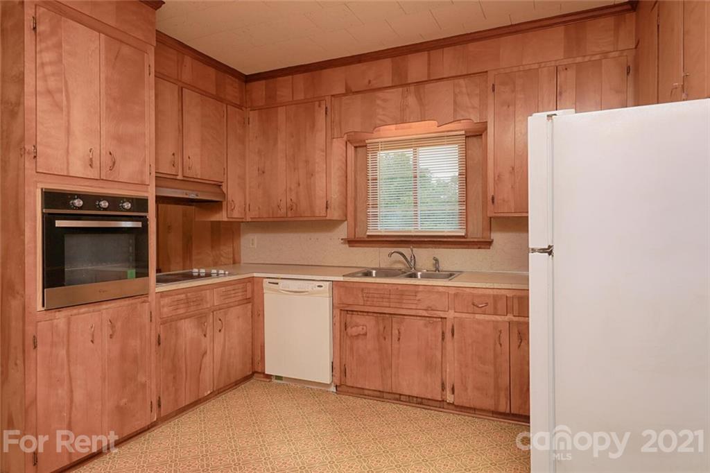 190 Turbyfill Road Mooresville, NC 28117 - Photo 7 of 28 a kitchen with stainless steel appliances a sink and a refrigerator