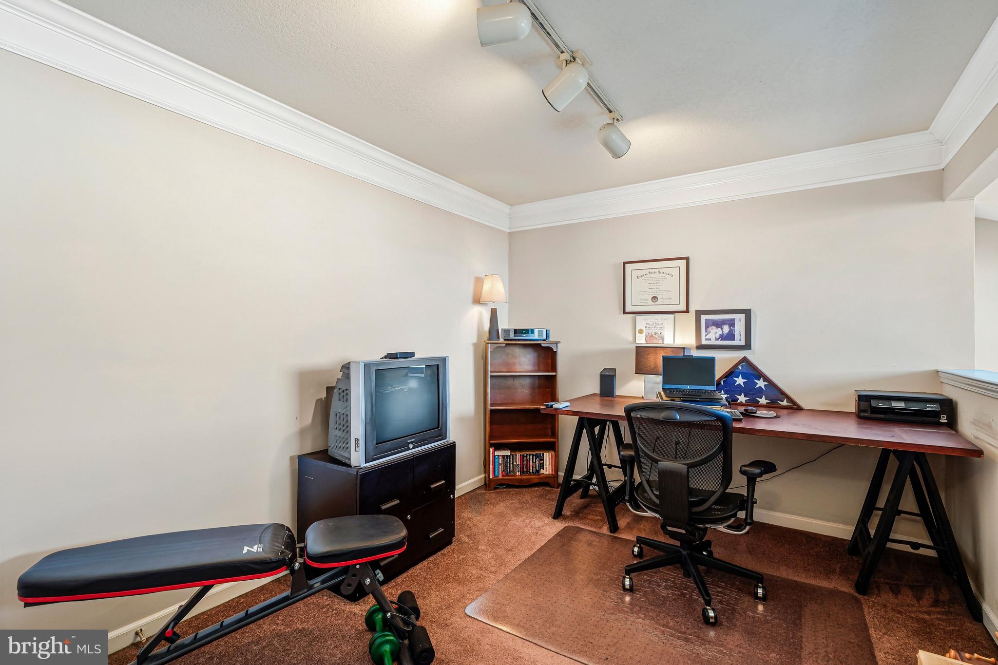 503 Sunset View Terrace Southeast, Unit 407 Leesburg, VA 20175 - Photo 16 of 35 a view of a workspace with furniture and a workspace