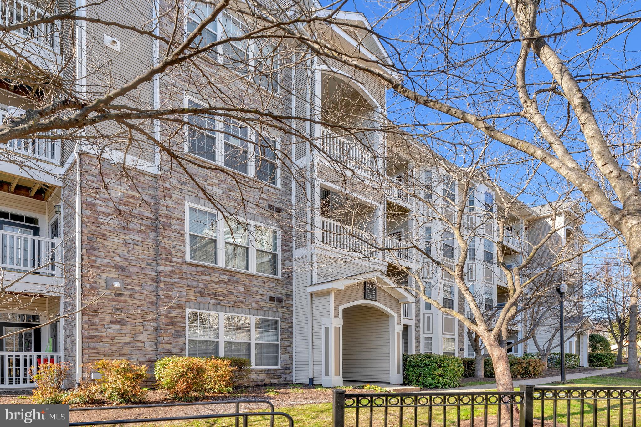 503 Sunset View Terrace Southeast, Unit 407 Leesburg, VA 20175 - Photo 2 of 35 a front view of a building