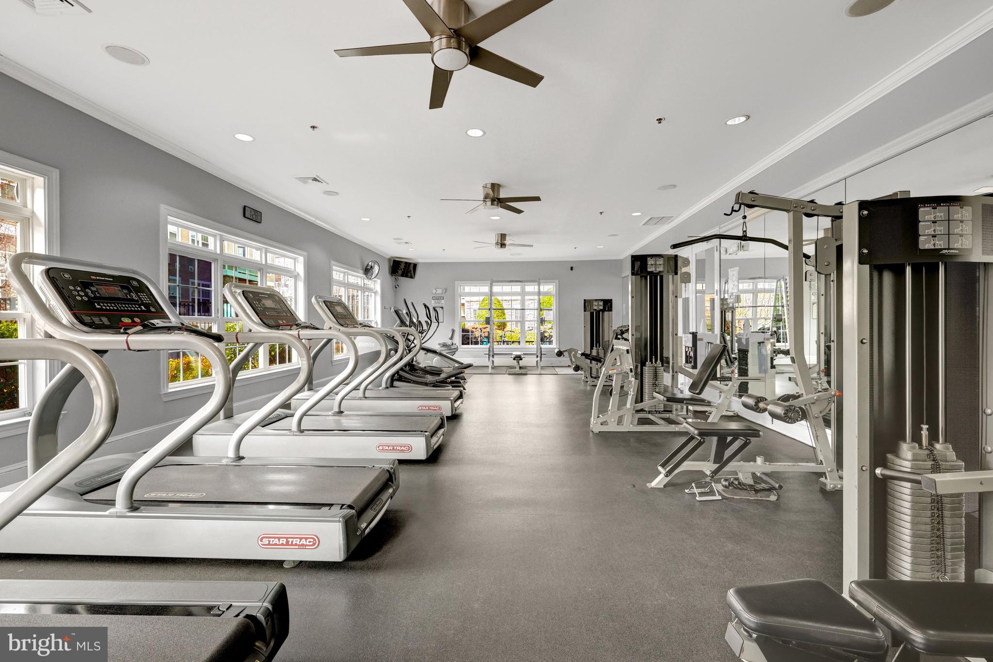 503 Sunset View Terrace Southeast, Unit 407 Leesburg, VA 20175 - Photo 32 of 35 a view of a room with gym equipment
