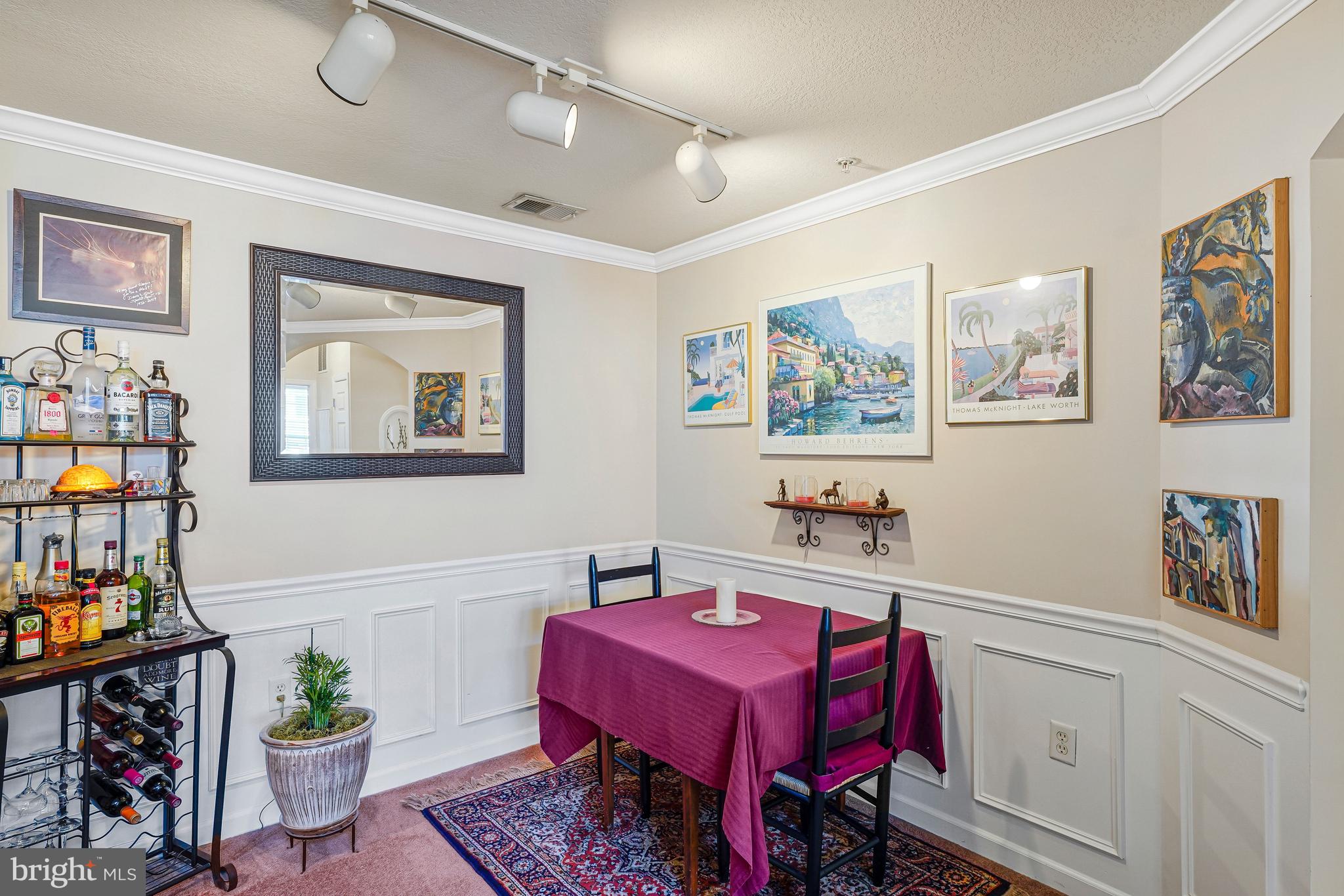503 Sunset View Terrace Southeast, Unit 407 Leesburg, VA 20175 - Photo 10 of 35 a living room with furniture and next to a window
