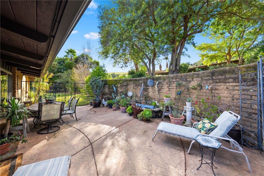 4706 Vía Tala Fallbrook, CA 92028 - Photo 41 of 73 Rear patio with view of the grassy yard.
