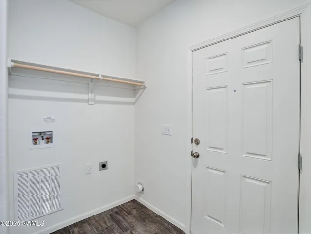 a kitchen with a sink a stove and a refrigerator