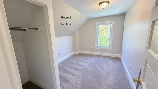 a view of a hallway with a elevator