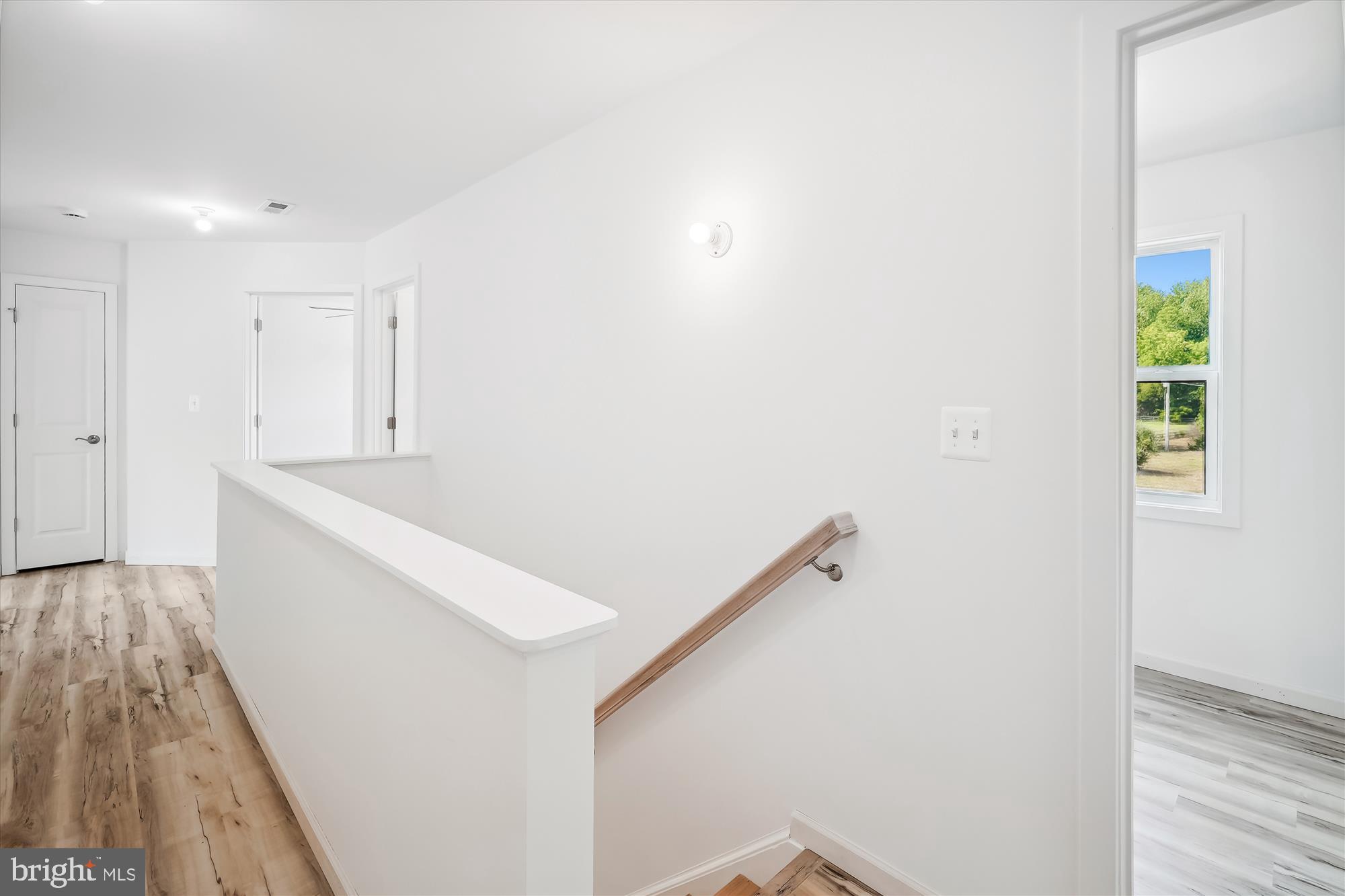 2 Cedar Ridge Road Rapidan, VA 22733 - Photo 36 of 60 a view of hallway with wooden floor