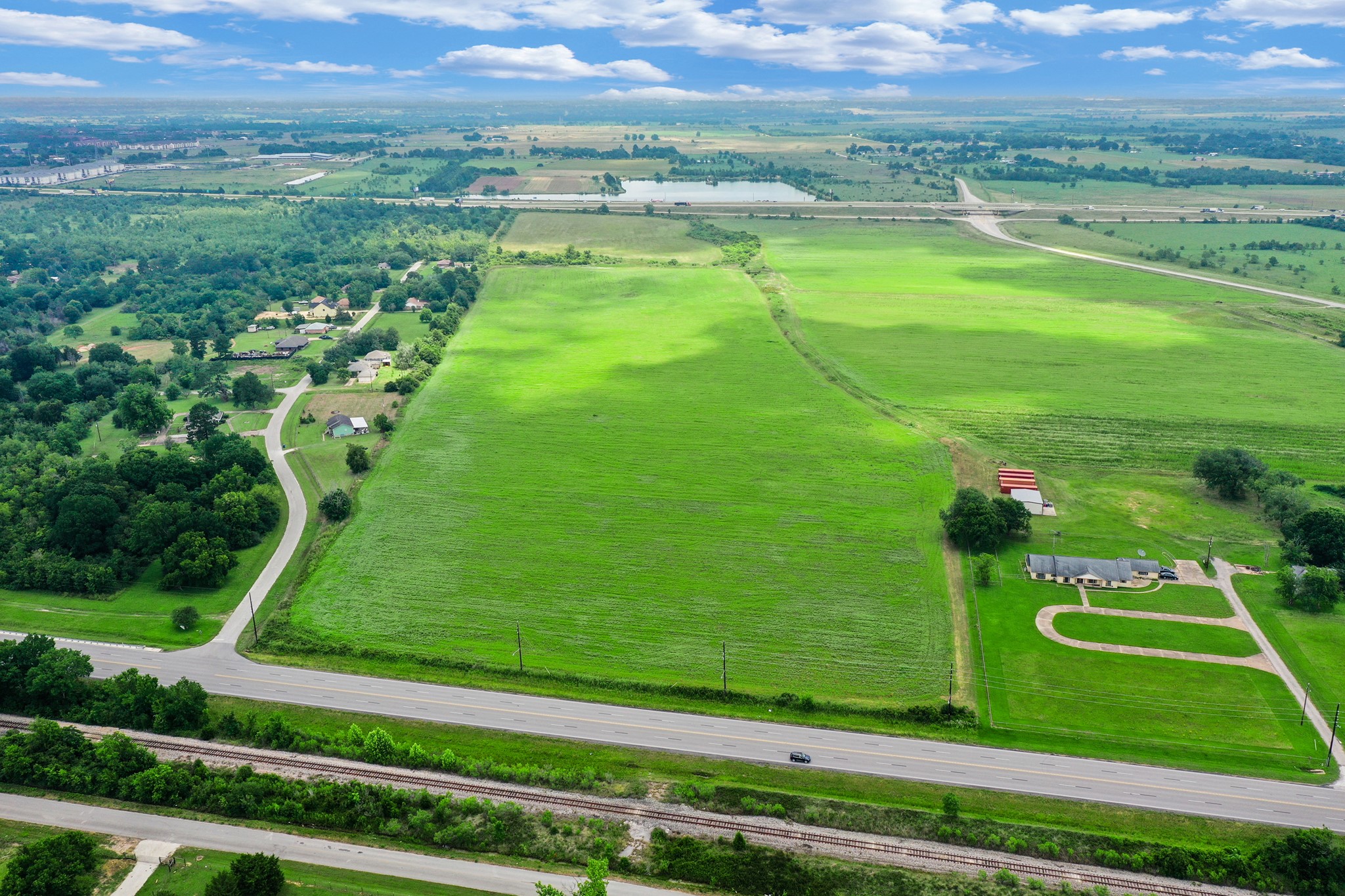 43306 Highway 290 Business Prairie View, TX 77484 - Photo 5 of 14 North-facing view with old Business Hwy 290 at bottom and Hwy 290 near the topo.