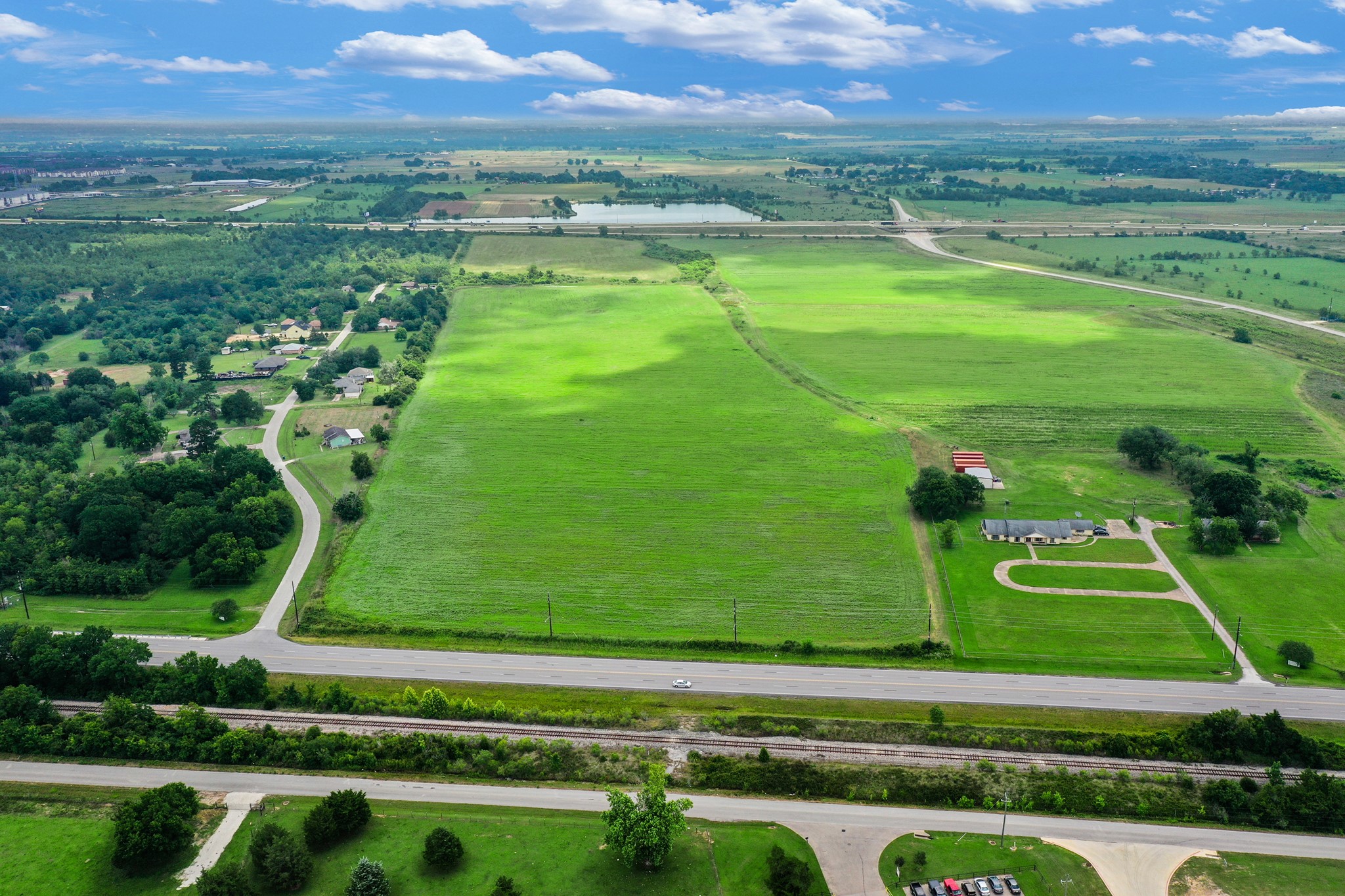 43306 Highway 290 Business Prairie View, TX 77484 - Photo 6 of 14 North-facing view of current access road from old Business Hwy 290.
