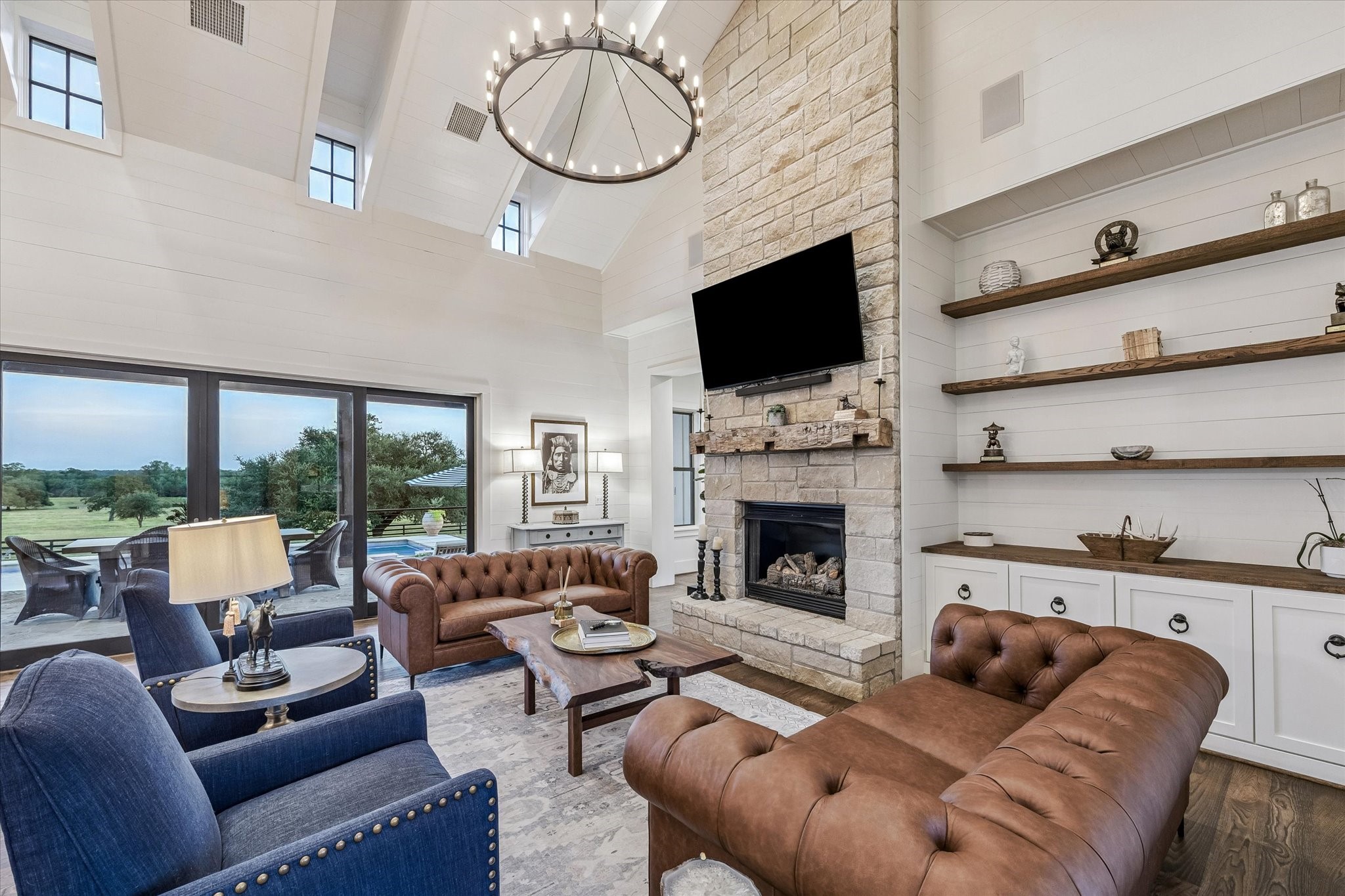 1600 South Weyand Road Round Top, TX 78954 - Photo 9 of 50 Living room with new leather sofas and two recliners