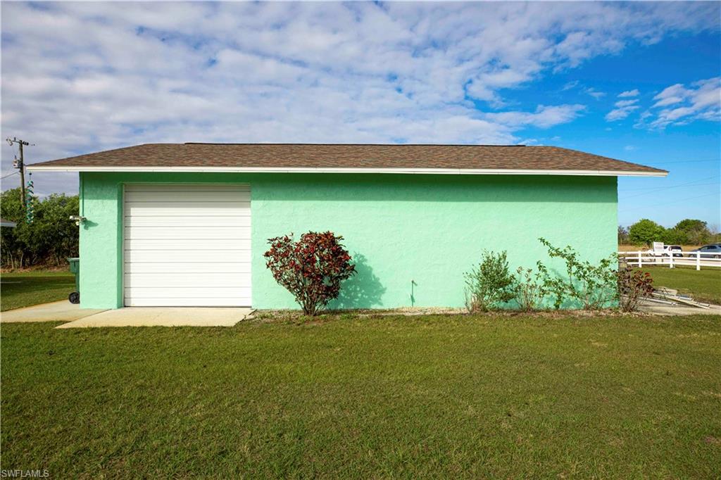 1900 Platt Road Naples, FL 34120 - Photo 5 of 35 27 x 40 Concrete Block Shop with Two 10 Ft Doors and LED Lighting