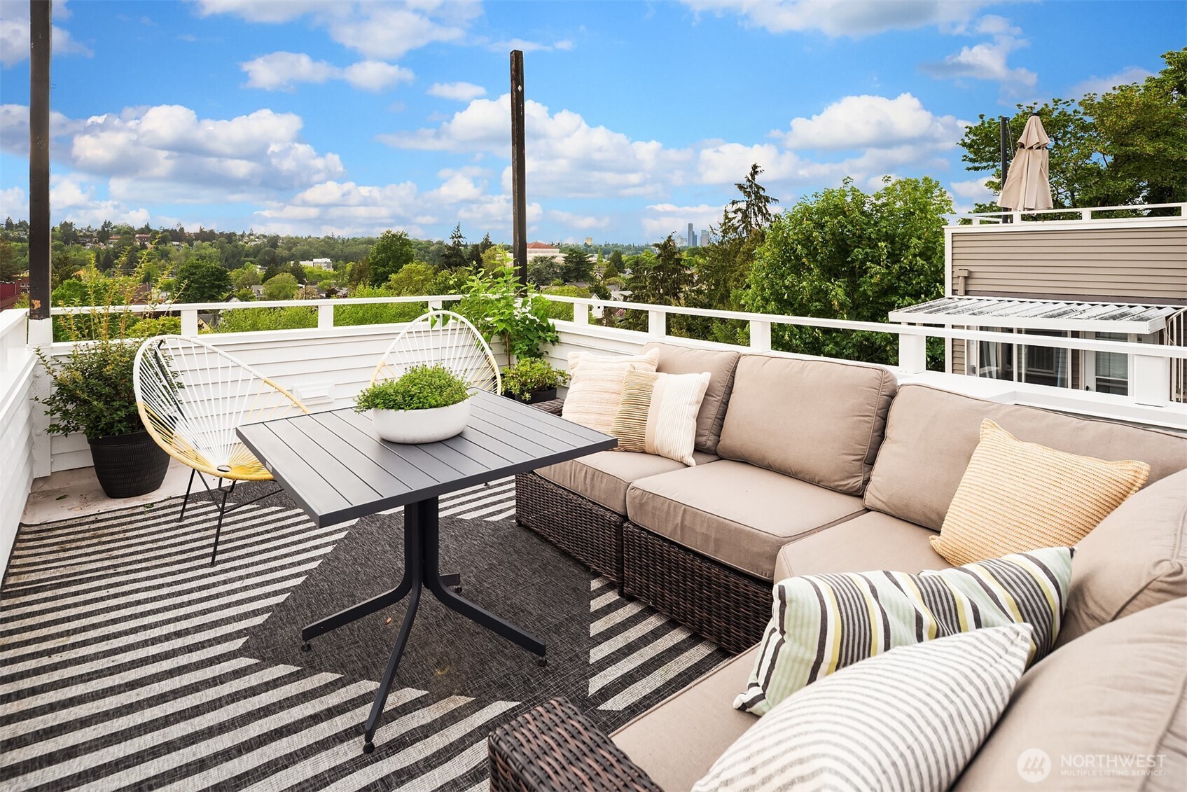 3309 37th Place South Seattle, WA 98144 - Photo 19 of 37 a view of a terrace with couches