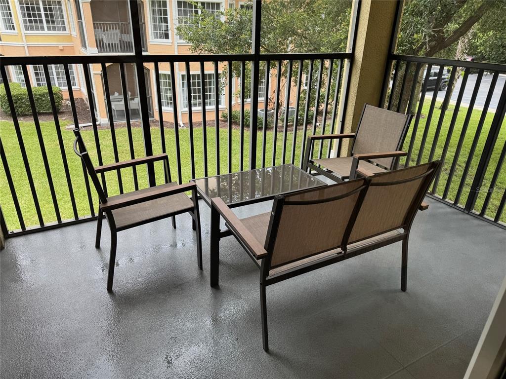 8762 Worldquest Boulevard, Unit 6203 Orlando, FL 32821 - Photo 16 of 31 a view of a bench in a roof deck