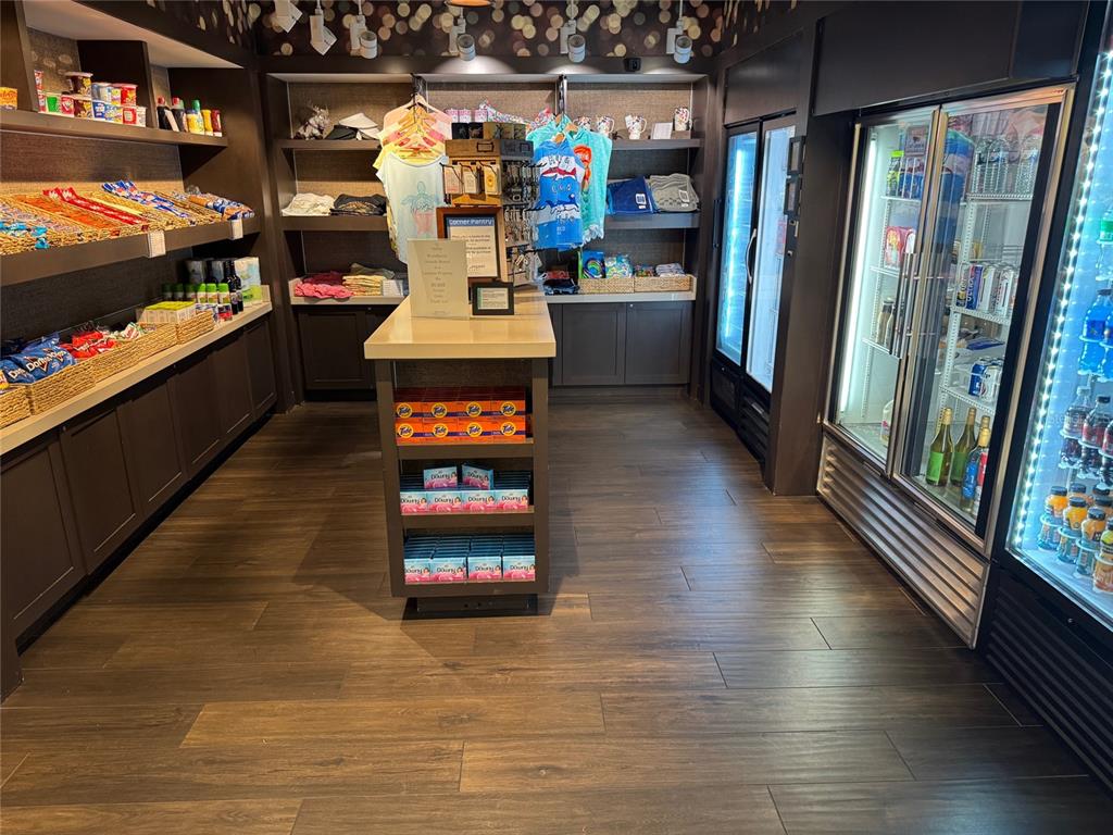 8762 Worldquest Boulevard, Unit 6203 Orlando, FL 32821 - Photo 29 of 31 a room with lots of different colored cloths