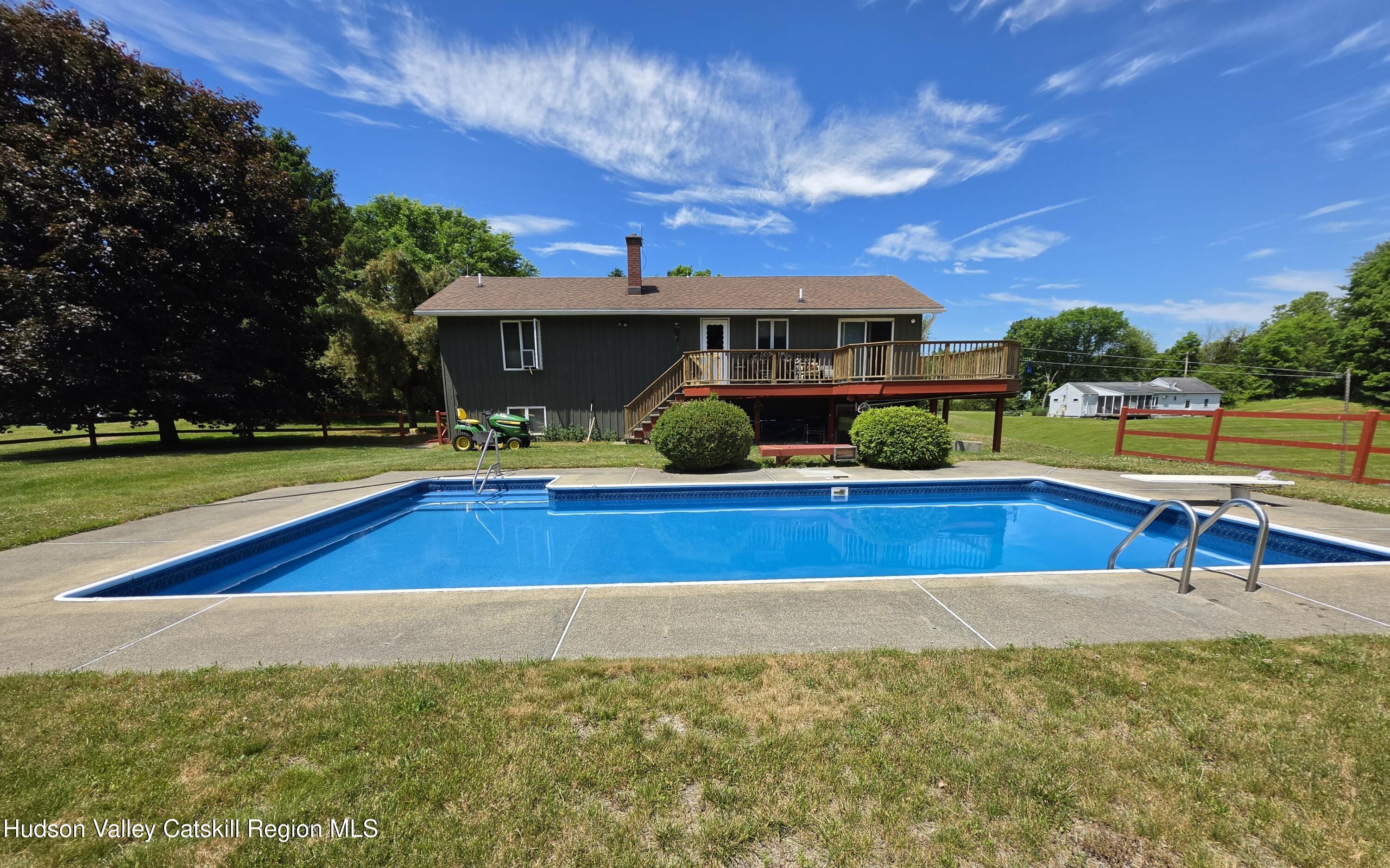 28 Hennett Road Valatie, NY 12184 - Photo 4 of 32 View of back with inground swimming pool