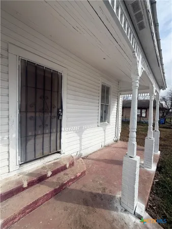 a front view of a house with a garage