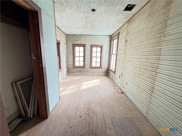 a view of a porch of a house