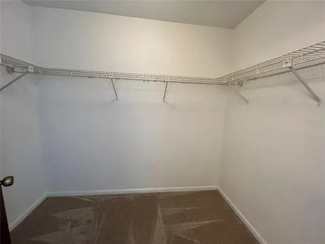 a view of a room with racks on the wall