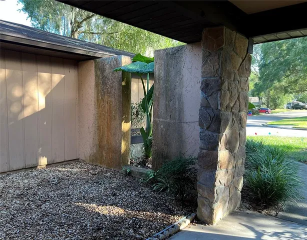 a backyard of a house with lots of green space