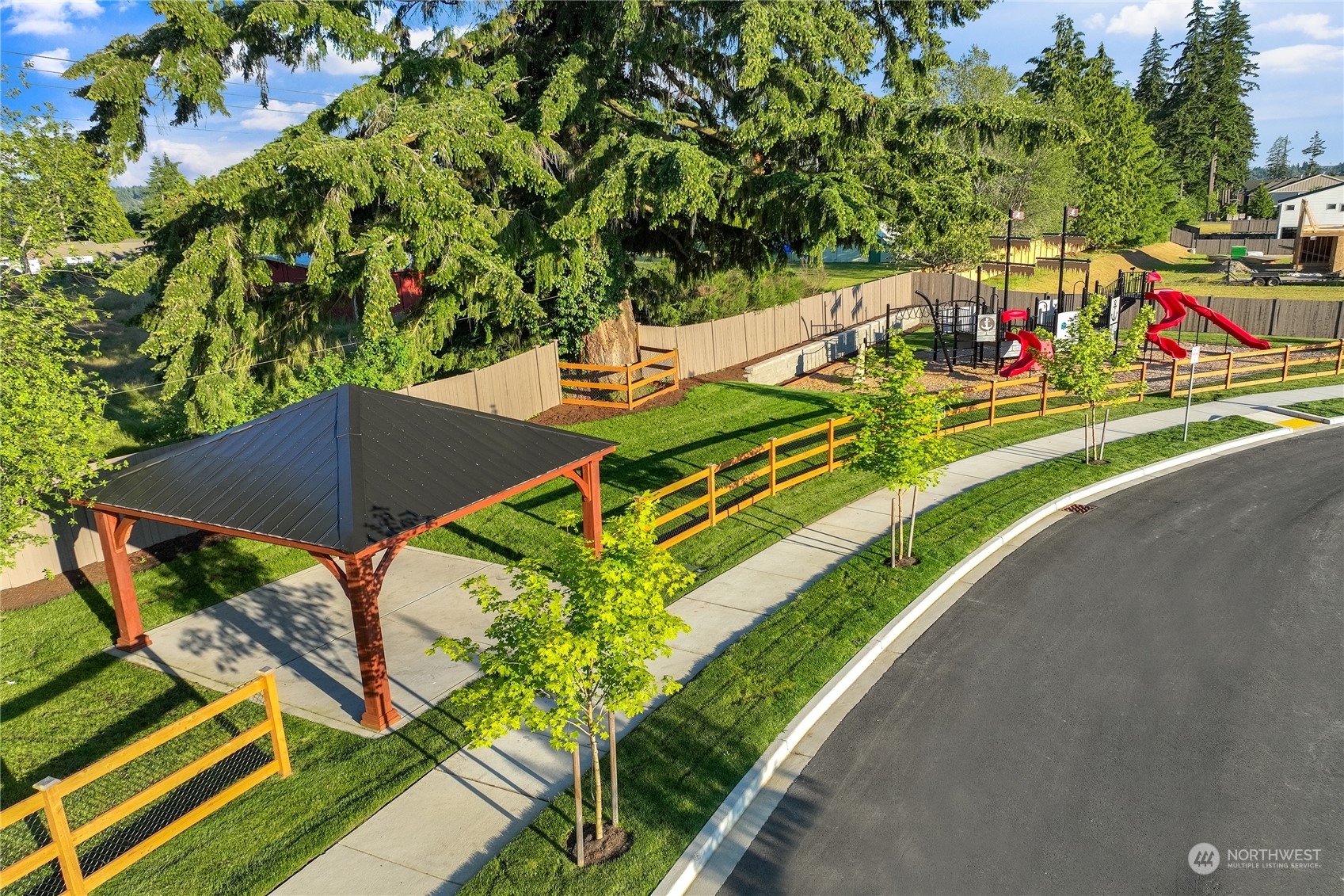 4417 242nd Place Southeast Bothell, WA 98021 - Photo 3 of 8 a view of a chairs and table in the balcony