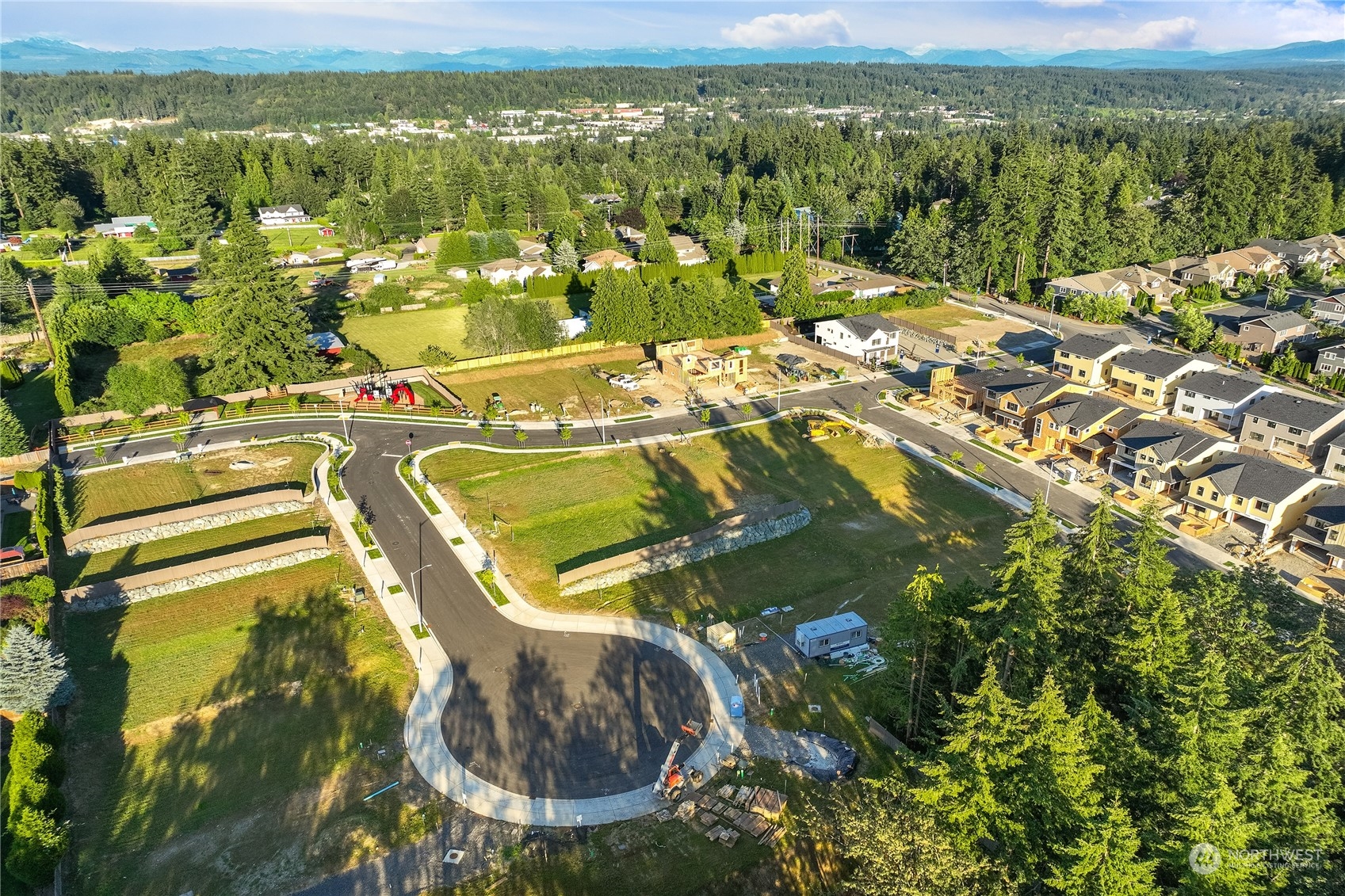 4417 242nd Place Southeast Bothell, WA 98021 - Photo 7 of 8 an aerial view of residential houses with outdoor space