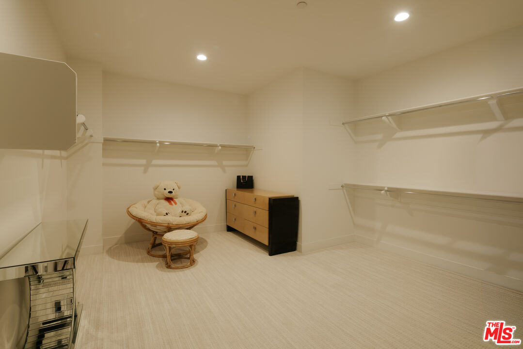 11773 Greenwood Drive Porter Ranch, CA 91326 - Photo 13 of 20 a room with storage and utility