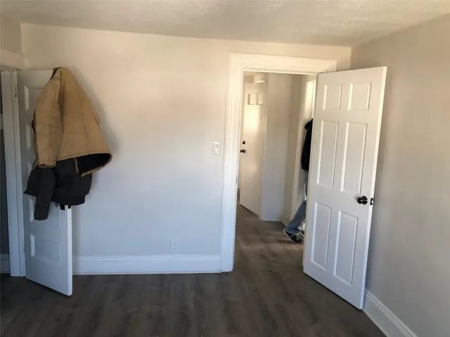 a view of hallway with walk in closet