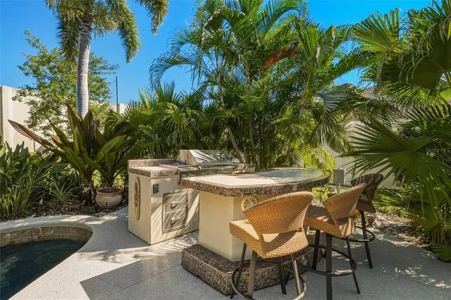 a view of a grassy field with trees