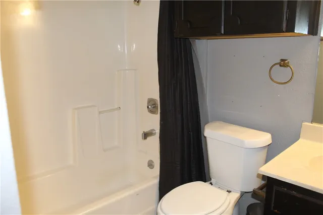 a bathroom with a sink and a toilet